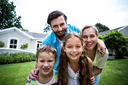 family enjoying backyard